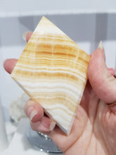 Load image into Gallery viewer, Diamond Orange Calcite Crystal Carving on Silver Stand Stone 165mm 4 BEAUTIFUL BANDING