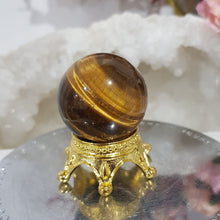 Load image into Gallery viewer, Tigers Eye Sphere Crystal Carving on Gold Stand Stone 30mm 1