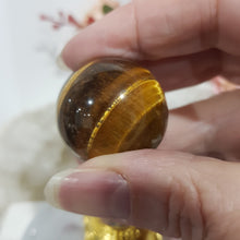 Load image into Gallery viewer, Tigers Eye Sphere Crystal Carving on Gold Stand Stone 30mm 1
