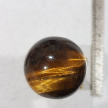 Load image into Gallery viewer, Tigers Eye Sphere Crystal Carving on Gold Stand Stone 30mm 1