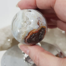 Load image into Gallery viewer, Mexican Agate Sphere Crystal Carving on Silver Stand Stone 45mm 1