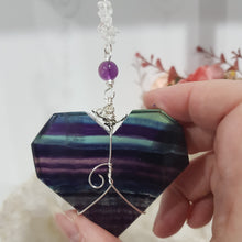 Load image into Gallery viewer, THE HEART OF CLARITY - INSIGHT / LOVE / CLARITY - Fluorite Heart Silver Wired Stone Crystal Energy Enhancer© / Hanger / Ornament / Sun catcher 200mm EE63