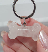 Load image into Gallery viewer, "THE LOYAL GUARDIAN" Crystal Collar Charm Dog Tag Quartz Bone Crystal Carving
FAITHFUL | PROTECTIVE | COMPANIONSHIP
"A dogs loyalty is one of life's greatest gifts.
The Loyal Guardian is a gentle reminder of the bond you share - always by their side through every adventure.
This charm celebrate the faithful heart that watches over yours every single day".
Chosen for the Loyal Guardian, Quartz symbolises the faithful companions that stand by us every day. Quartz is a beautiful Crystal to celebrate
