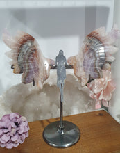 Load image into Gallery viewer, Amethyst Agate Angel Wings on stand.
Inspires Intuition and connection to the divine
Angel Wings
Symbolise love, protection, purity and freedom. Connections to the Angels and divine realm.
Beautiful Amethyst Agate Angel wings on stand. A must for any crystal collection!