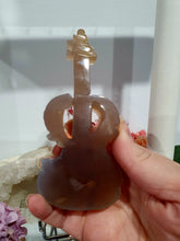 Load image into Gallery viewer, Beautiful Guitar Agate Crystal Carving Stone on Silver Stand. Promotes balance and harmony.