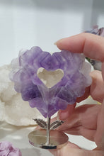 Load image into Gallery viewer, Lovely Amethyst Heart Flower Crystal Carving on silver stand. Gorgeous little statement piece. Great Crystal Gift Idea. Inspires Intuition and spirituality