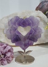 Load image into Gallery viewer, Lovely Amethyst Heart Flower Crystal Carving on silver stand. Gorgeous little statement piece. Great Crystal Gift Idea. Inspires Intuition and spirituality