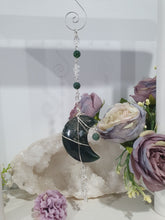 Load image into Gallery viewer, The Grounding Moon Crystal Energy Enhancer Suncatcher. Stunning Moss agate Moon beaded with Moss Agate and quartz. Hang in your home or space and feel the ambient energy. Great Crystal gift idea.