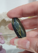 Load image into Gallery viewer, Blue Tigers Eye Crystal Tumble Stone
Inspires Courage
Gorgeous Blue Tigers Eye Crystal Tumble Stone. Absolutely stunning shine