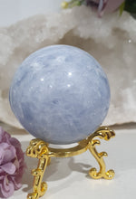 Load image into Gallery viewer, Celestite Sphere Crystal Carving on Gold Stand. Inspires Communication with the Angels
