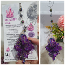 Load image into Gallery viewer, ENCHANTED AURA - Handcrafted Titanium Aura Quartz Crystal Energy Enhancer© / Hanger / Ornament / Suncatchers
EMPOWERMENT | PROTECTION | MAGICK
Gorgeous handcrafted Titanium Aura Quartz crystal beaded with Rainbow Hematite and Hematite. Wire wrapped in silver
Genuine Crystals. no plastic or glass. Ensuring energy flow throughout the enhancer.