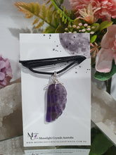 Load image into Gallery viewer, "WING OF AN ANGEL" Amethyst Angel Wing Crystal Stone Pendant wire wrapped Silver .
Inspires Divine Connection and Intuition.
Angel Wings symbolise love, protection, purity and freedom. Connections to the Angels and divine realm.
Beautiful handcrafted Amethyst Angel Wing Crystal Carving Pendant in silver non tarnish wire. Comes with a cord necklace.