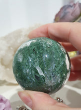 Load image into Gallery viewer, Lovely Moss Agate Sphere Crystal carving on silver stand. Beautiful Druzy! Great Crystal Gift Idea. Promotes Grounding and connection to earth