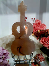 Load image into Gallery viewer, Beautiful Guitar Agate Crystal Carving Stone on Silver Stand. Promotes balance and harmony.