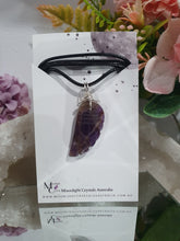 Load image into Gallery viewer, "WING OF AN ANGEL" Amethyst Angel Wing Crystal Stone Pendant wire wrapped Silver .
Inspires Divine Connection and Intuition.
Angel Wings symbolise love, protection, purity and freedom. Connections to the Angels and divine realm.
Beautiful handcrafted Amethyst Angel Wing Crystal Carving Pendant in silver non tarnish wire. Comes with a cord necklace.