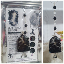 Load image into Gallery viewer, LIGHT THROUGH DARKNESS" Handcrafted Black Agate Tower Crystal Carving Silver Crystal Energy Enhancer© Gemstone / Hanger / Suncatcher / Ornament
STRENGTH | COURAGE | CLARITY
Beautiful Black Agate Tower Carving Crystal Energy Enhancer© / Sun Catcher / Ornament / Hanger beaded with Black Agate, Quartz and Herkimer Diamonds. wired in Silver