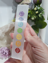 Load image into Gallery viewer, Selenite Cleansing Crystal Slab with Rainbow Chakra Symbols Stone. Inspires Connection to the Angelic Realms
Beautiful Selenite Slab with Embossed Chakra Symbols.. Perfect to cleanse your space and crystals