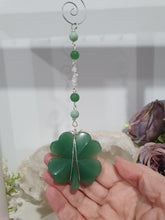 Load image into Gallery viewer, LUCKY FOUR-LEAF CLOVER BLESSINGS Aventurine Crystal Carving Silver Stone Crystal Energy Enhancer© / Hanger / Ornament / Suncatchers
GOOD FORTUNE | HOPE | MAGIC | PROTECTION
A four-leaf clover Symbolises good luck and abundance. It is believed if you hold a four-leaf clover you will gain the ability to see fairies and leprechauns and find their treasures.
Beautiful Aventurine four-leaf clover crystal carving beaded with Amazonite, Aventurine and Quartz. Wire wrapped in Silver