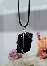 Load image into Gallery viewer, Gorgeous Black Tourmaline crystal stone wire wrapped in silver with black cord. Black Tourmaline promotes protective energy.