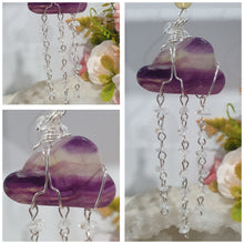 Load image into Gallery viewer, Lovely "EVERY CLOUD HAS A SILVER LINING" Fluorite Cloud silver wired Crystal Energy Enhancer© Hanger Ornament Suncatcher.
From Darkness comes Light.
TRANSFORMATION / INTUITION / SPIRITUALITY
Beautiful Fluorite Cloud Crystal Carving beaded with Fluorite & Quartz. wired in Silver