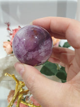 Load image into Gallery viewer, Purple Fluorite Sphere Crystal Carving Stone on Gold Branch shaped stand.