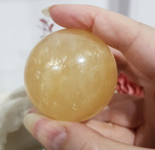 Load image into Gallery viewer, Honey Calcite Crystal Sphere on gold stand Stone Carving 45mm 4