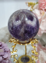 Load image into Gallery viewer, Amethyst Chevron Sphere Crystal Carving Stone on Gold Stand
Inspires INTUITION AND SPIRITUALITY
Lovely Amethyst Crystal Sphere on gold stand. Gorgeous colouring.