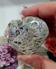 Load image into Gallery viewer, Gorgeous Titanium Aura Sphalerite Heart Crystal Carving Stone on plastic Stand. Aids in psychic energy, Uplifts and balances