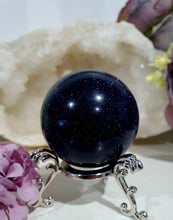 Load image into Gallery viewer, Sparkly Blue Sandstone Sphere Crystal Carving on Silver Stand. Inspires Concentration and Courage. Gorgeous