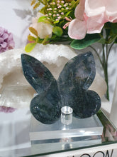 Load image into Gallery viewer, Butterfly Moss Agate Crystal Carving Stone on Stand. Inspires tranquility and grounding.
Beautiful polished Moss Agate Butterfly Crystal Carving on plastic stand