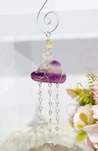 Load image into Gallery viewer, Lovely "EVERY CLOUD HAS A SILVER LINING" Fluorite Cloud silver wired Crystal Energy Enhancer© Hanger Ornament Suncatcher.
From Darkness comes Light.
TRANSFORMATION / INTUITION / SPIRITUALITY
Beautiful Fluorite Cloud Crystal Carving beaded with Fluorite & Quartz. wired in Silver