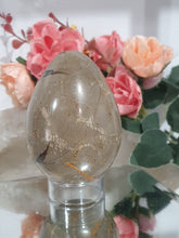 Load image into Gallery viewer, Beautiful polished Septarian Egg Crystal Carving Stone on plastic stand. A must for any crystal collector