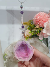 Load image into Gallery viewer, MAGICAL CRYSTAL CAVE - Handcrafted Titanium Aura Quartz Geode Crystal Energy Enhancer© / Hanger / Ornament / Suncatchers
DIVINE COMMUNICATION | HARMONY | MAGICK
Gorgeous Titanium Aura Quartz Geode crystal beaded with Rose Quartz, Amethyst and Rainbow Hematite. Wire wrapped in silver
Genuine Crystals. no plastic or glass. Ensuring energy flow throughout the enhancer.