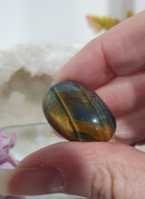 Load image into Gallery viewer, Blue Tigers Eye Crystal Tumble Stone
Inspires Courage
Gorgeous Blue Tigers Eye Crystal Tumble Stone. Lovely shine