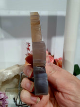 Load image into Gallery viewer, Beautiful Guitar Agate Crystal Carving Stone on Silver Stand. Promotes balance and harmony.