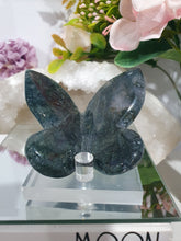Load image into Gallery viewer, Butterfly Moss Agate Crystal Carving Stone on Stand. Inspires tranquility and grounding.
Beautiful polished Moss Agate Butterfly Crystal Carving on plastic stand