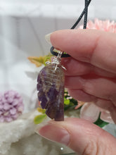 Load image into Gallery viewer, "WING OF AN ANGEL" Amethyst Angel Wing Crystal Stone Pendant wire wrapped Silver .
Inspires Divine Connection and Intuition.
Angel Wings symbolise love, protection, purity and freedom. Connections to the Angels and divine realm.
Beautiful handcrafted Amethyst Angel Wing Crystal Carving Pendant in silver non tarnish wire. Comes with a cord necklace.