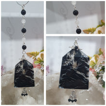 Load image into Gallery viewer, LIGHT THROUGH DARKNESS" Handcrafted Black Agate Tower Crystal Carving Silver Crystal Energy Enhancer© Gemstone / Hanger / Suncatcher / Ornament
STRENGTH | COURAGE | CLARITY
Beautiful Black Agate Tower Carving Crystal Energy Enhancer© / Sun Catcher / Ornament / Hanger beaded with Black Agate, Quartz and Herkimer Diamonds. wired in Silver