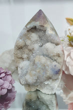 Load image into Gallery viewer, Titanium Aura Sphalerite Flame Tower Druzy Crystal Cluster
PROMOTES PSYCHIC DEVELOPMENT AND UPLIFTS
Absolutely Stunning Titanium Aura Sphalerite Crystal Flame Crystal Cluster. The Druzy and formation on this is spectacular!.