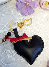 Load image into Gallery viewer, Love & Seductions Crystal Keyring on gold. Vinyl Heart with bow. Beaded with Obsidian, Carnelian and pyrite. Protection, Love and Seduction.