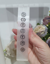 Load image into Gallery viewer, Selenite Cleansing Crystal Slab with Silver Chakra Symbols Stone. Inspires Connection to the Angelic Realms
Beautiful Selenite Slab with Embossed Chakra Symbols.. Perfect to cleanse your space and crystals
