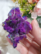 Load image into Gallery viewer, ENCHANTED AURA - Handcrafted Titanium Aura Quartz Crystal Energy Enhancer© / Hanger / Ornament / Suncatchers
EMPOWERMENT | PROTECTION | MAGICK
Gorgeous handcrafted Titanium Aura Quartz crystal beaded with Rainbow Hematite and Hematite. Wire wrapped in silver
Genuine Crystals. no plastic or glass. Ensuring energy flow throughout the enhancer.