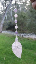 Load image into Gallery viewer, THE FEATHER OF AN ANGEL - Handcrafted Rose Quartz Feather Silver Wired Crystal Energy Enhancer© | Hanger | Ornament | Suncatcher
ANGELIC CONNECTION | LOVE | INTUITION
Gorgeous Rose Quartz feather crystal carving beaded with Amethyst and Rose Quartz. Wire wrapped in non tarnish silver