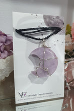Load image into Gallery viewer, Lepidolite Moon Crystal Pendant Wire Wrapped Silver Stone with black cord chain
STONE OF TRANSITION
Beautiful Lepidolite Moon Crystal Carving Wire Wrapper in Silver non tarnish wire. Accompanied by a black cord necklace