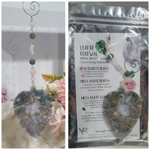 Load image into Gallery viewer, LEAF OF RENEWAL - Handcrafted Moss Agate Leaf silver Crystal Energy Enhancer© / Hanger / Ornament / Suncatcher
SPIRITUAL GROWTH | LOVE | BALANCE
Gorgeous Moss Agate leaf crystal carving beaded with Rose Quartz & Moss Agate. Wire wrapped in silver
Genuine Crystals. no plastic or glass. Ensuring energy flow throughout the enhancer.