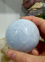 Load image into Gallery viewer, Celestite Sphere Crystal Carving on Silver Stand. Inspires Communication with the Angels