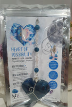 Load image into Gallery viewer, HEART OF POSSIBILITY" Handcrafted Apatite Heart Crystal Carving Silver Crystal Energy Enhancer© / Hanger / Ornament / Suncatcher
MANIFEST | LOVE | HARMONY
Gorgeous Apatite heart crystal carving beaded with Apatite, Rose Quartz & Quartz. Wire wrapped in silver