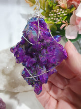 Load image into Gallery viewer, ENCHANTED AURA - Handcrafted Titanium Aura Quartz Crystal Energy Enhancer© / Hanger / Ornament / Suncatchers
EMPOWERMENT | PROTECTION | MAGICK
Gorgeous handcrafted Titanium Aura Quartz crystal beaded with Rainbow Hematite and Hematite. Wire wrapped in silver
Genuine Crystals. no plastic or glass. Ensuring energy flow throughout the enhancer.