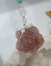 Load image into Gallery viewer, "THE BLUSHING ROSE" Strawberry Quartz Rose Carving silver Crystal Energy Enhancer© Hanger Ornament Suncatcher.
HAPPINESS / LOVE / HARMONY
"THE BLUSHING ROSE - Like the petals of a rose unfolding, The Blushing Rose encourages us to embrace self-love, joy and the beauty within."
Gorgeous Strawberry Quartz Rose Crystal Carving beaded with Ice Pink Malaysian Jade, Rose Quartz, Amazonite and Quartz. Wire wrapped in silver