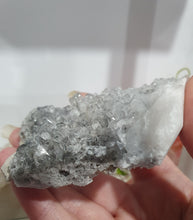 Load image into Gallery viewer, Apophyllite Crystal Cluster Specimen Stone on plastic Stand
Promotes Divine Guidance
Lovely Apophyllite crystal cluster on plastic stand. Has tiny crystals poking out of it. The photos just don't pick up the lovely sparkles.